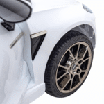 Aston Martin DBX na akumulator dla dzieci Biały + Pilot + EVA + Pasy + Wolny Start + Audio LED - obrazek 9